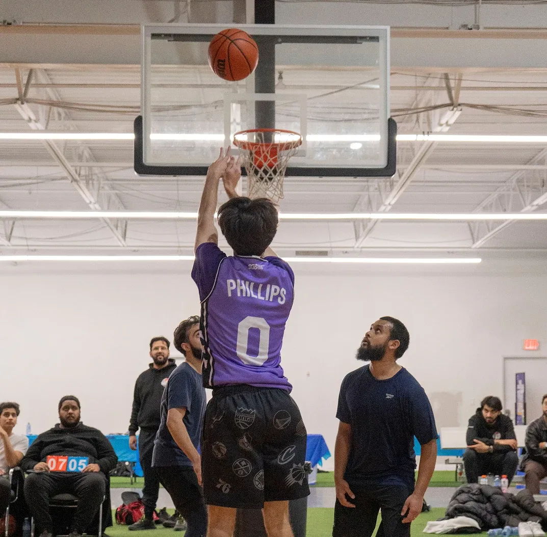 A player taking a shot during Hoops 4 Humanity